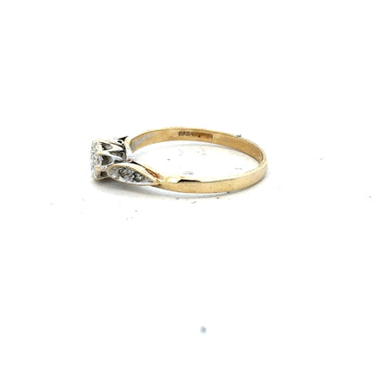 9ct yellow gold diamond ring in size P with sparkling diamonds, showcasing elegant jewelry craftsmanship.