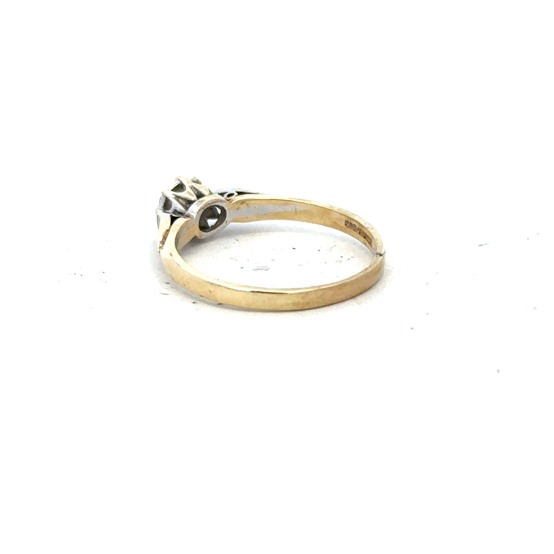 9ct yellow gold diamond ring in size P with sparkling diamonds, showcasing elegant jewelry craftsmanship.