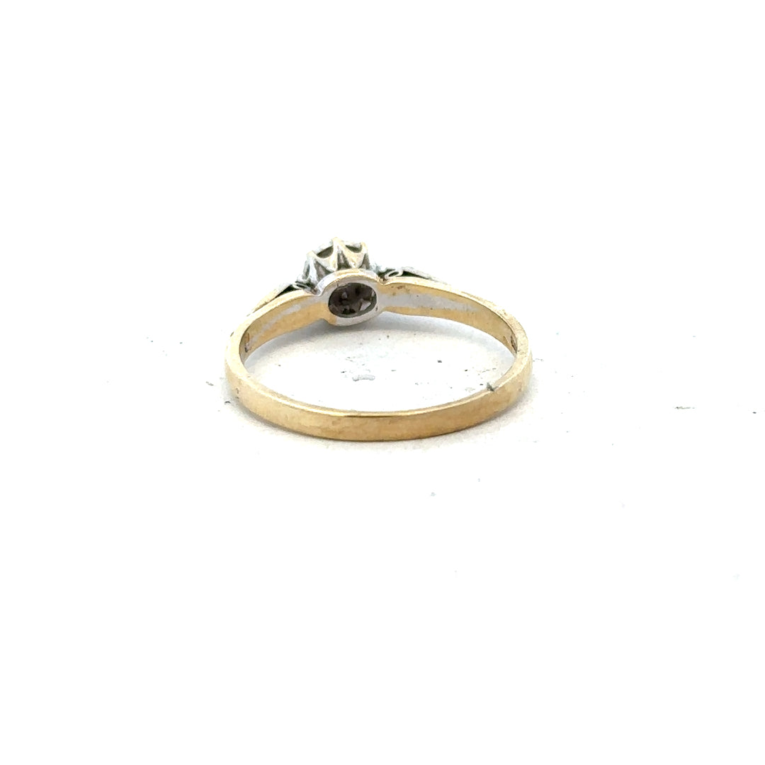 9ct yellow gold diamond ring in size P with sparkling diamonds, showcasing a fine jewelry design.