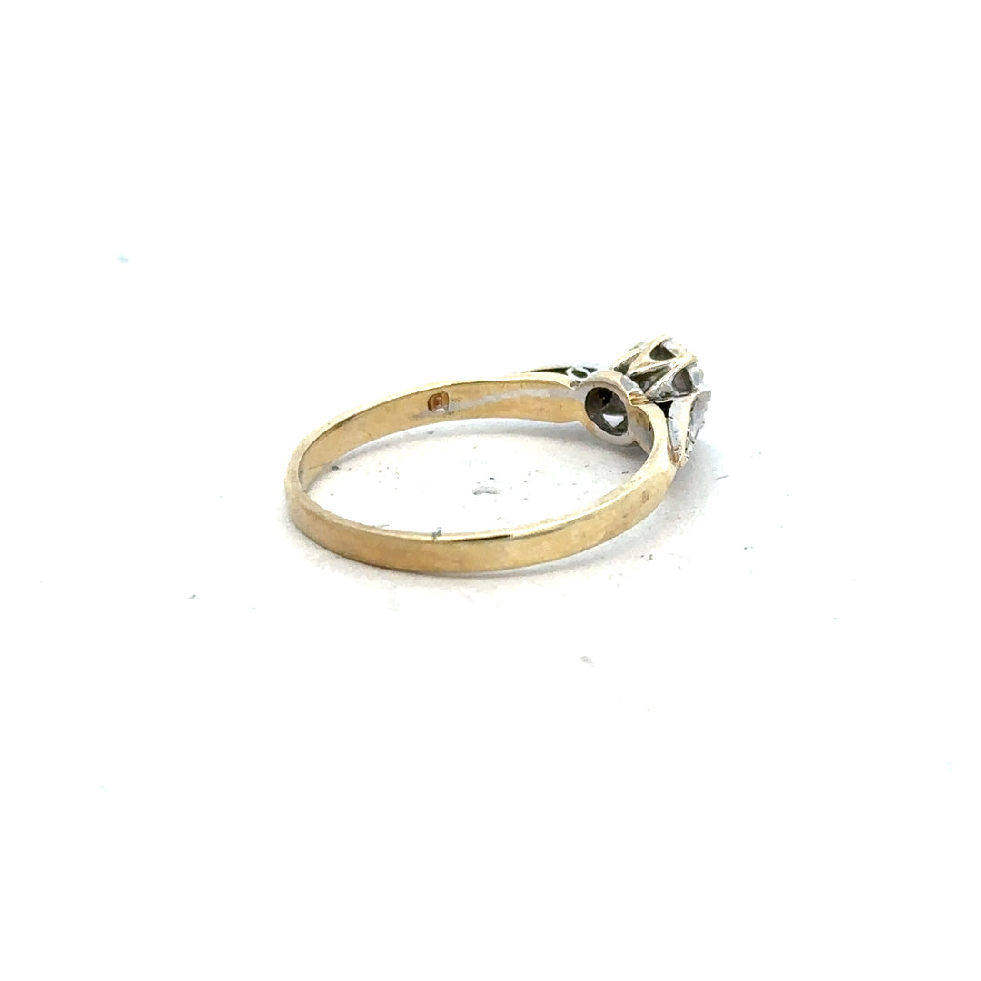 9ct yellow gold diamond ring in size P with sparkling diamonds, showcasing elegant jewelry design.