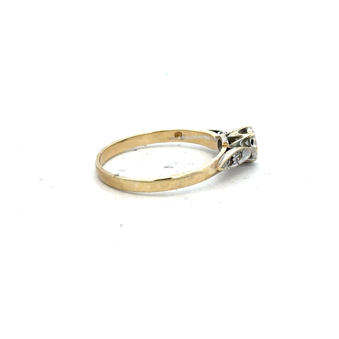 9ct yellow gold diamond ring in size P with sparkling diamonds, showcasing a delicate and elegant jewelry design.