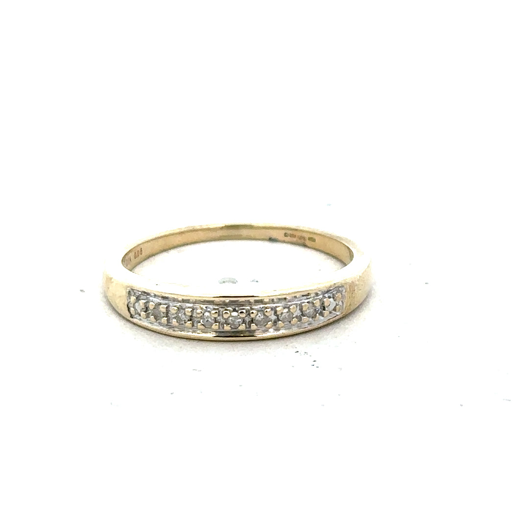 9ct yellow gold diamond ring in size P with sparkling diamonds, crafted with elegant design and quality craftsmanship.