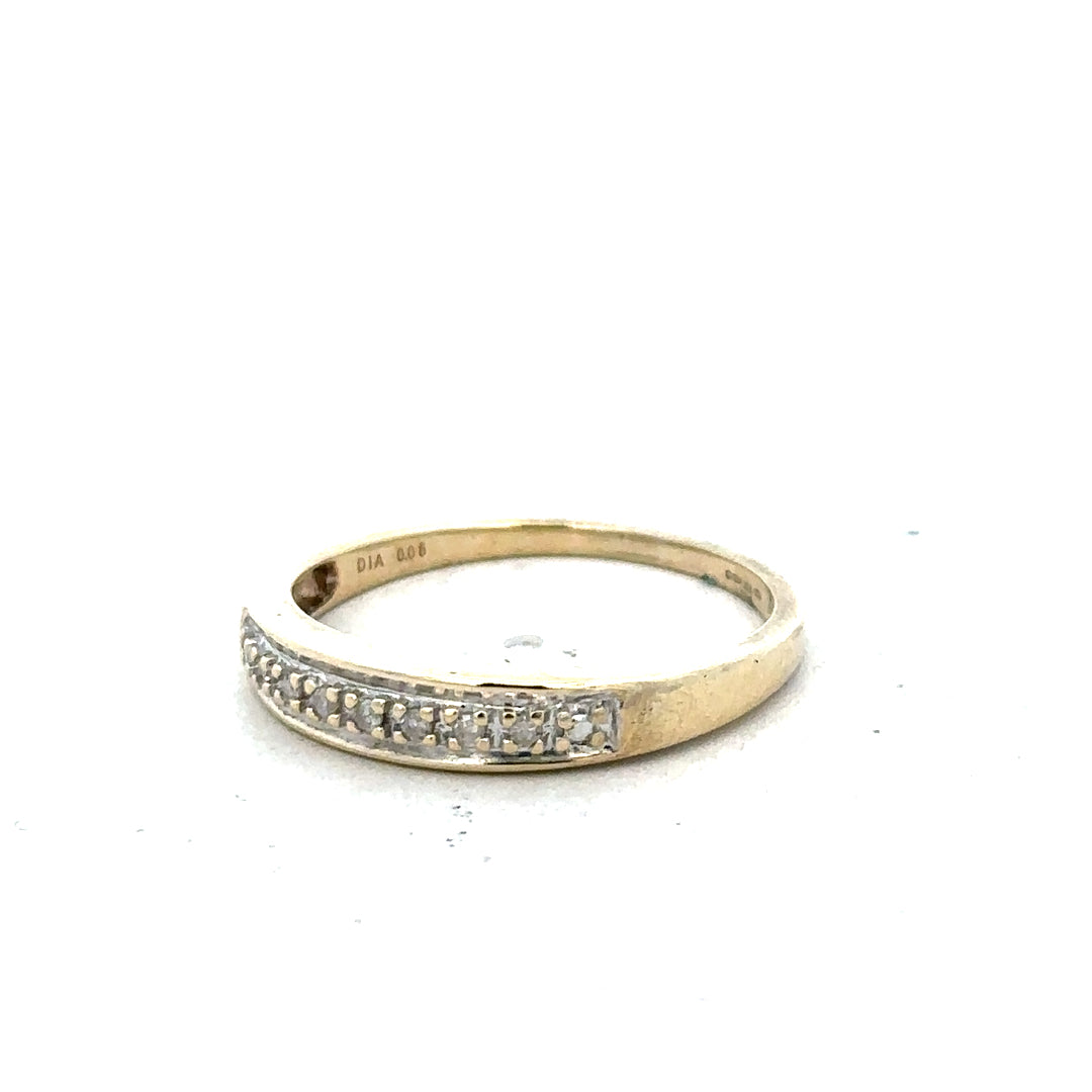 9ct yellow gold diamond ring in size P with sparkling diamonds, showcasing elegant craftsmanship and classic design.