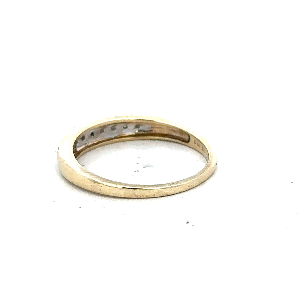 9ct yellow gold diamond ring in size P with sparkling diamonds, showcasing elegant jewelry craftsmanship.