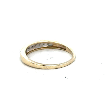 9ct yellow gold diamond ring in size P with sparkling diamonds, showcasing elegant jewelry craftsmanship.