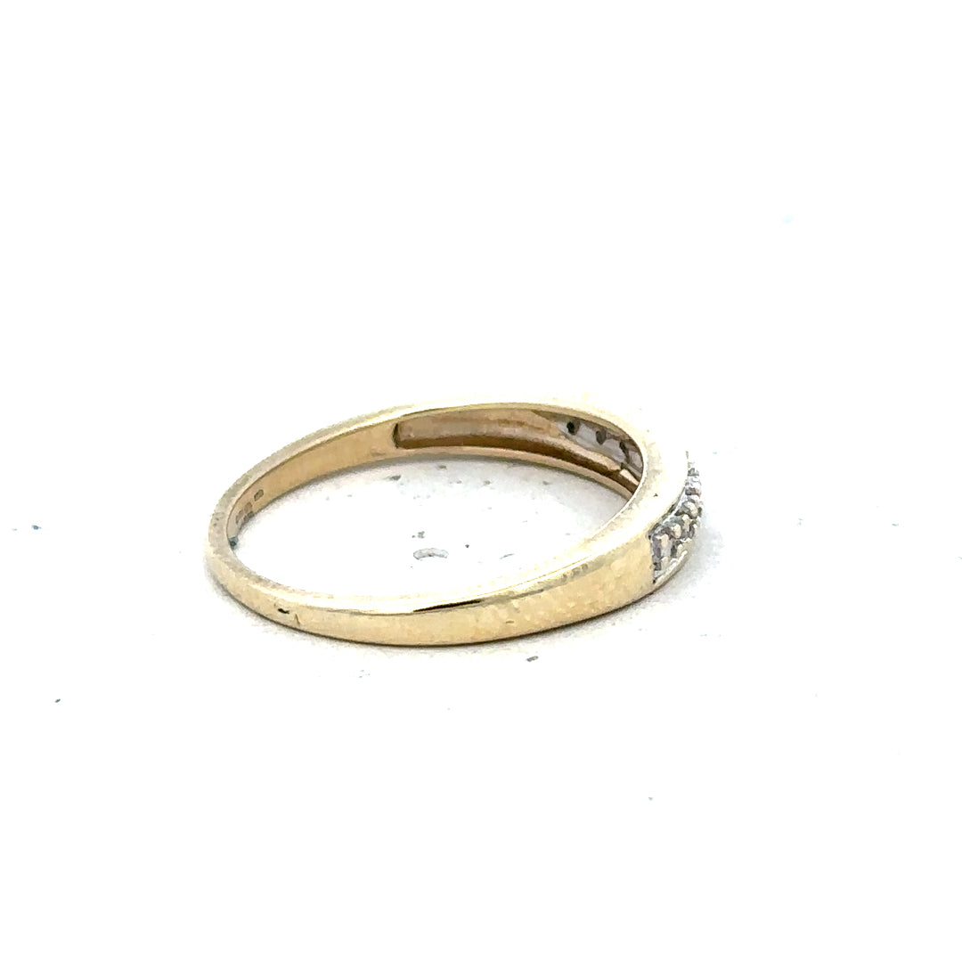 9ct yellow gold diamond ring in size P with sparkling diamonds, unbranded jewelry displayed on a white background.