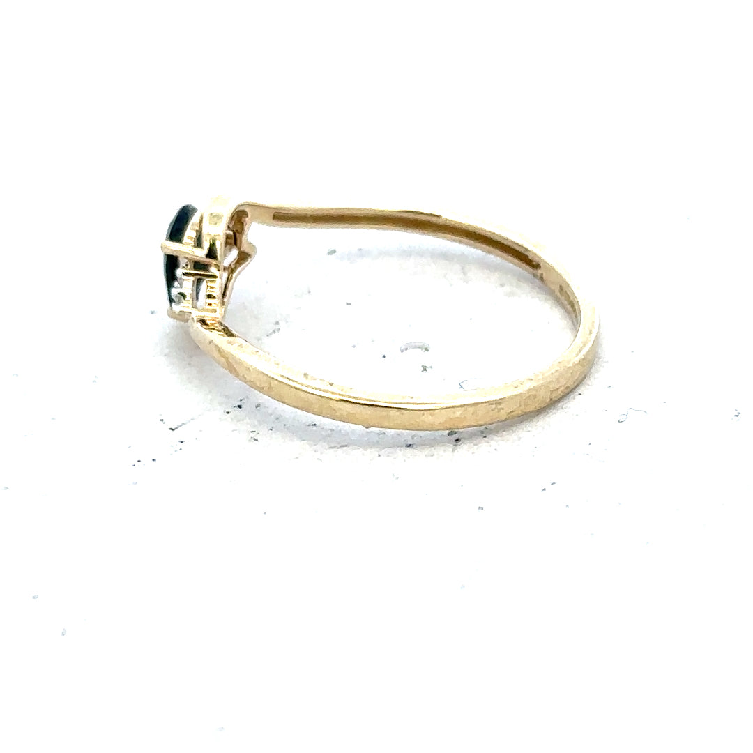 9ct yellow gold diamond ring in size P with sparkling diamonds, showcasing an elegant jewelry design.