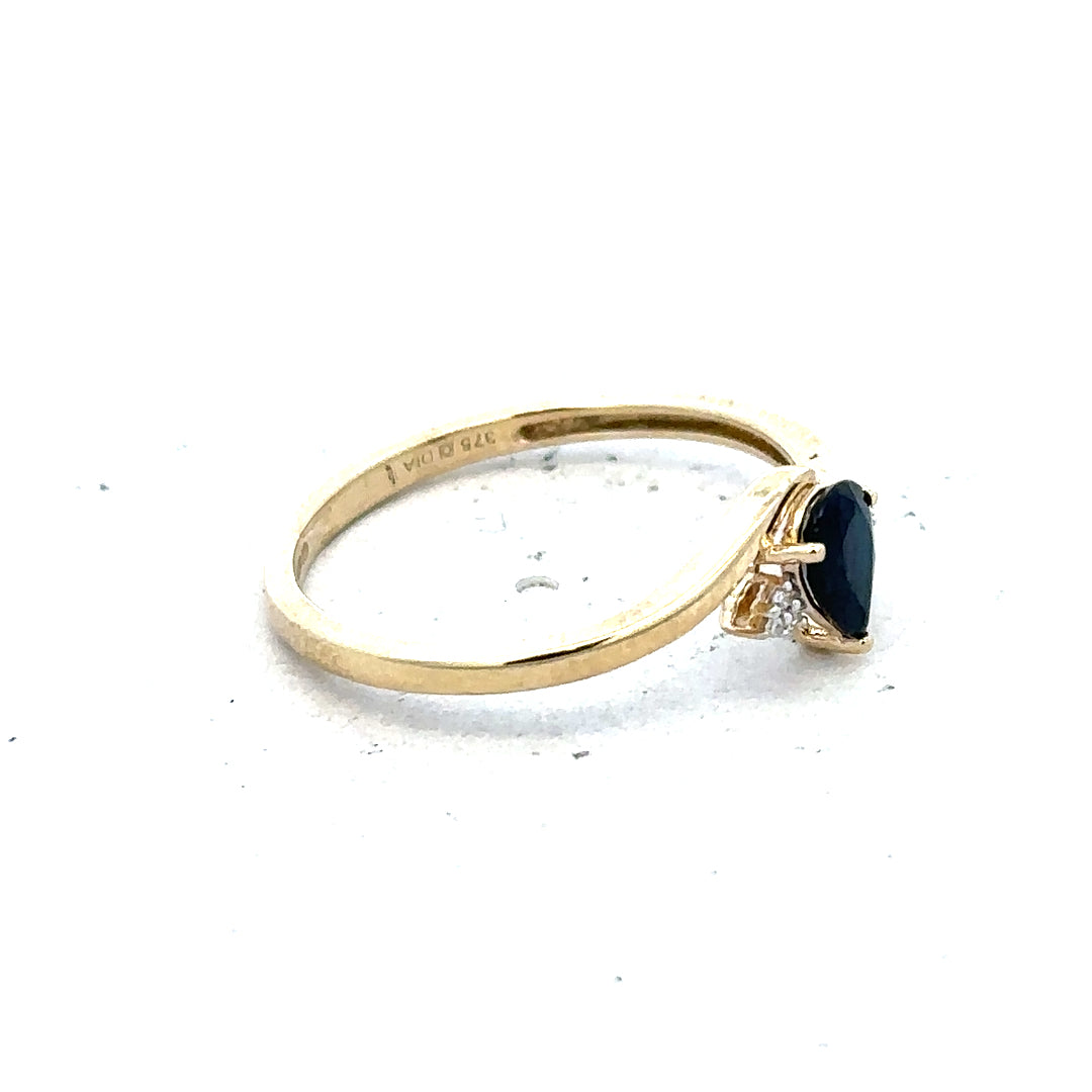 9ct yellow gold diamond ring in size P with sparkling diamonds, showcasing a elegant and classic jewelry design.