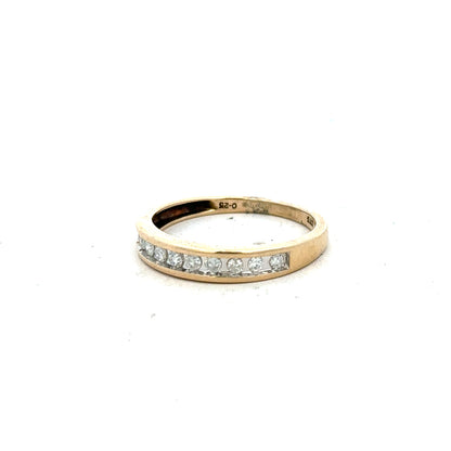 9ct yellow gold diamond ring in size P1/2 with sparkling diamonds, showcasing a simple elegant design.