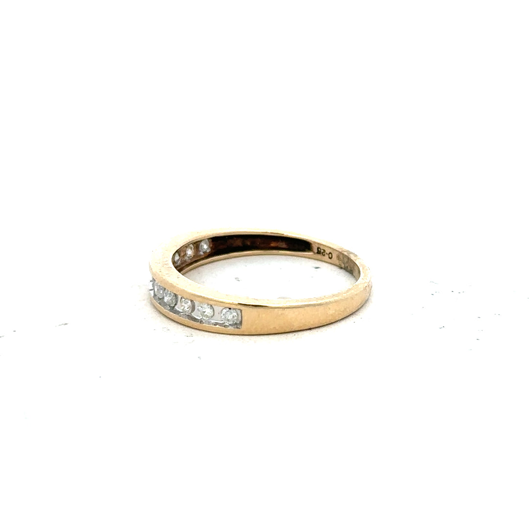 9ct yellow gold diamond ring in size P1/2 with a sparkling diamond setting on a plain background.