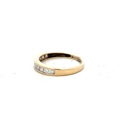 9ct yellow gold diamond ring in size P1/2 with a sparkling diamond setting on a plain background.