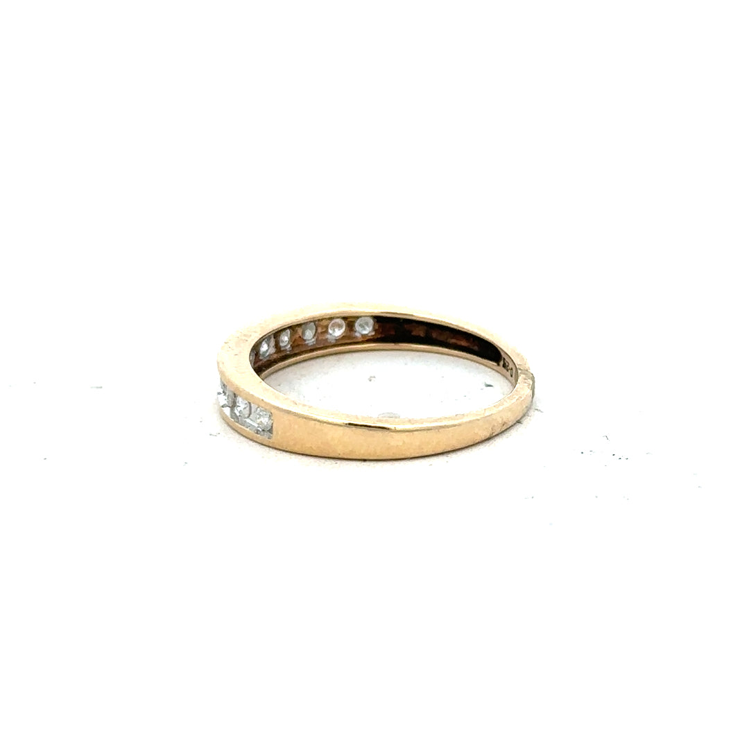 9ct yellow gold diamond ring size P1/2 with sparkling diamonds, showcasing elegant craftsmanship and timeless design.
