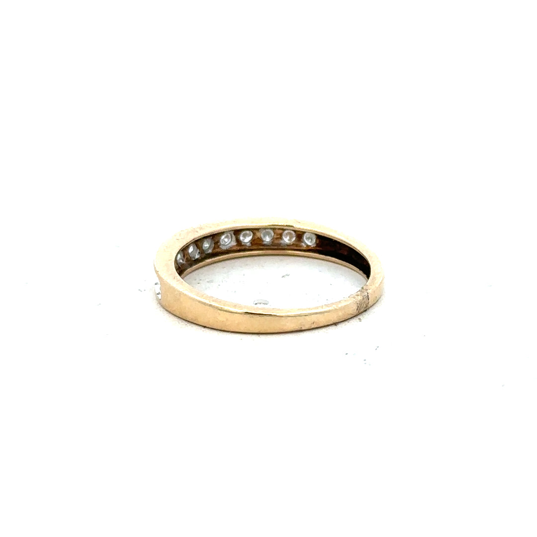 9ct yellow gold diamond ring in size P1/2, featuring a sparkling diamond setting on a classic band.