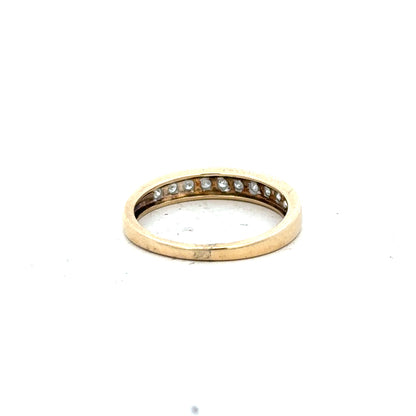 9ct yellow gold diamond ring in size P 1/2 with sparkling diamonds, featuring a classic, elegant design.