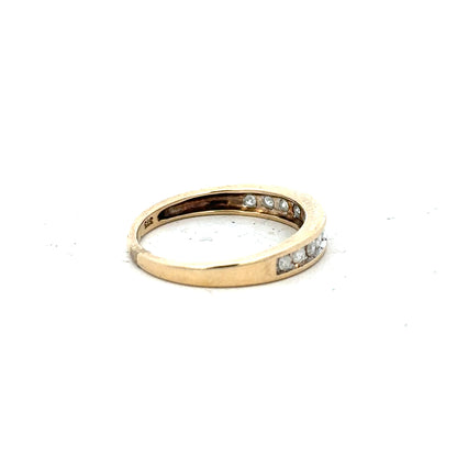 9ct yellow gold diamond ring size P1/2 with sparkling diamonds, showcasing a classic elegant design.