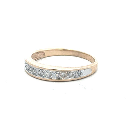 9ct yellow gold diamond ring in size Q with sparkling diamonds, featuring a sleek design.
