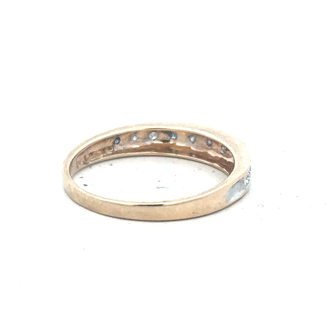 9ct yellow gold diamond ring in size Q with sparkling diamonds, unbranded jewelry piece.