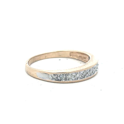 9ct yellow gold diamond ring in size Q with sparkling diamonds, unbranded jewelry displayed against a neutral background.