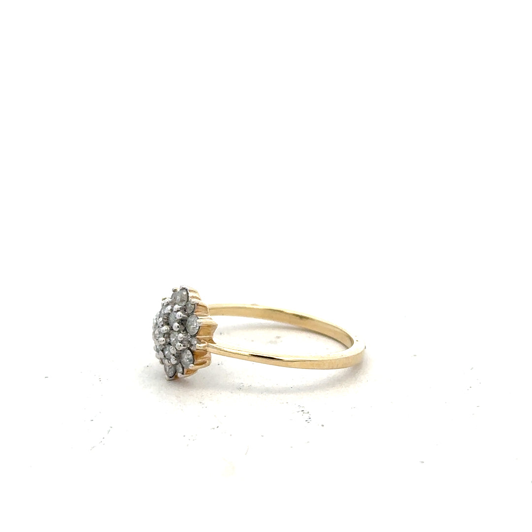 9ct yellow gold diamond ring in size R with sparkling diamonds, showcasing its elegant design.