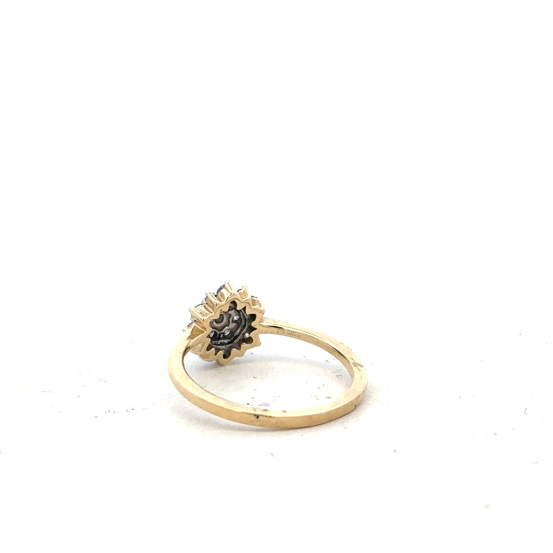 9ct yellow gold diamond ring in size R with sparkling diamonds, showcasing elegant jewelry design.