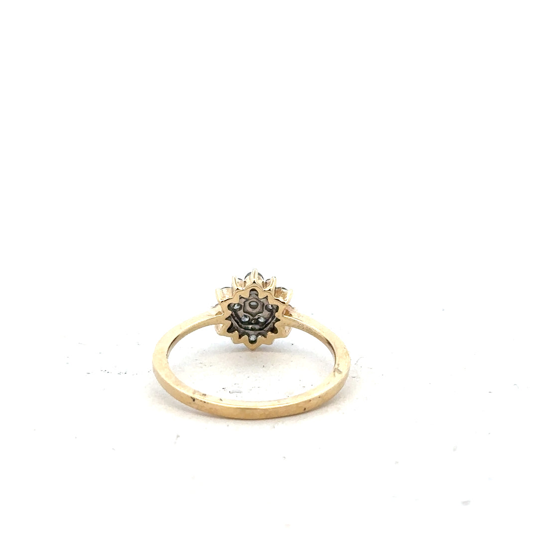 9ct yellow gold diamond ring size R, unbranded, showcasing a sparkling diamond band with intricate gold detailing.