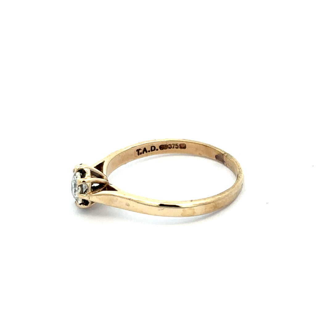 9ct yellow gold diamond ring in size R featuring a sparkling diamond, unbranded jewelry with elegant craftsmanship.