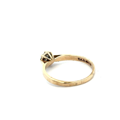 9ct yellow gold diamond ring in size R with sparkling diamonds, featuring a classic and elegant design.