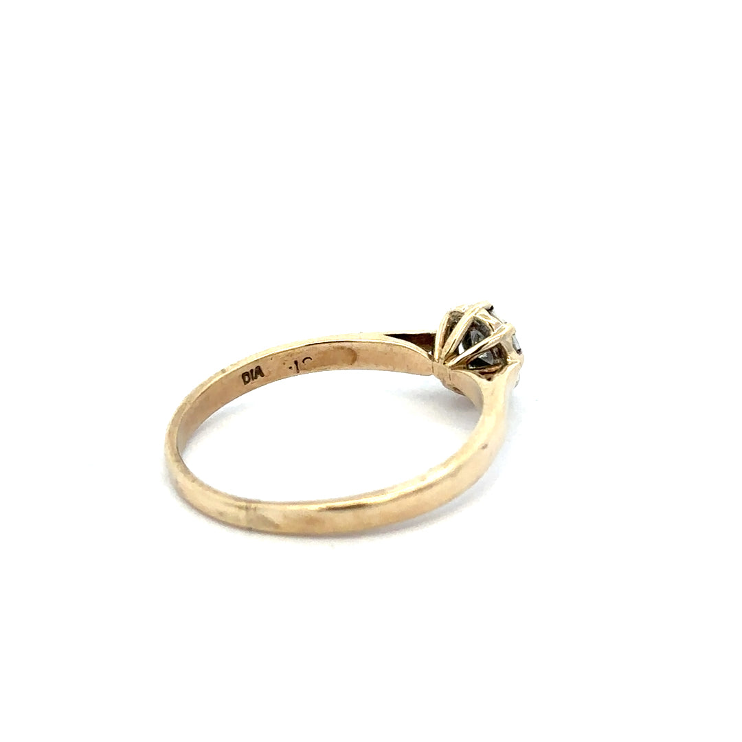 9ct yellow gold diamond ring in size R with sparkling diamonds, featuring a classic and elegant design.