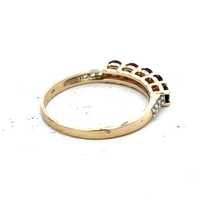 9ct yellow gold diamond ring in size R1/2 with a sparkling central diamond, unbranded jewelry shown on a plain background.