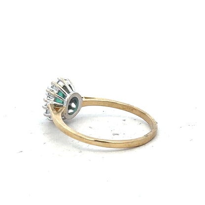 9ct yellow gold diamond ring in size S with sparkling diamonds, unbranded jewelry piece on a plain background.