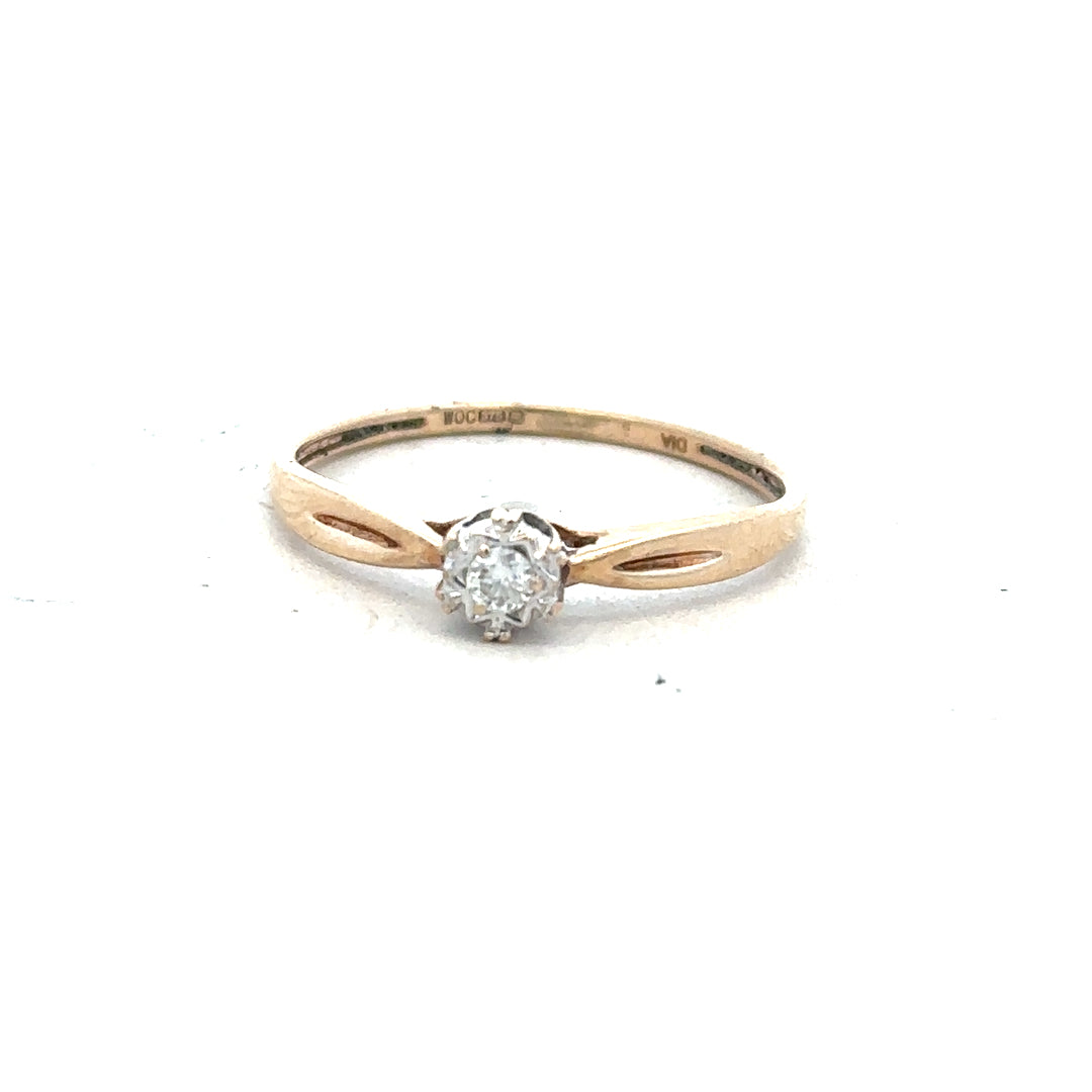 9ct yellow gold diamond ring in size S with sparkling diamonds, featuring a sleek, elegant design.