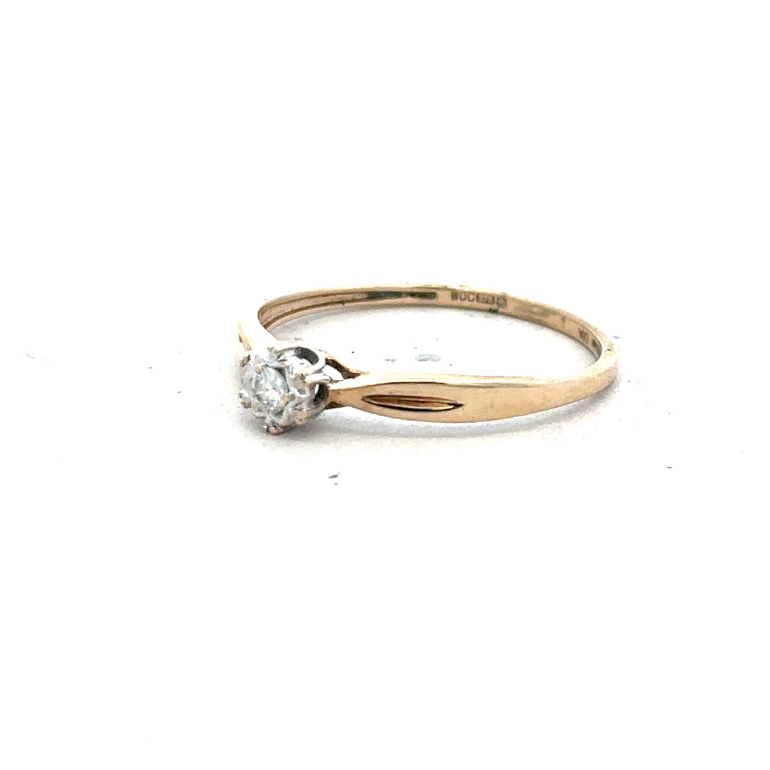 9ct yellow gold diamond ring in size S with sparkling diamonds, showcasing elegant jewelry design.