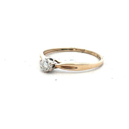 9ct yellow gold diamond ring in size S with sparkling diamonds, showcasing elegant jewelry design.