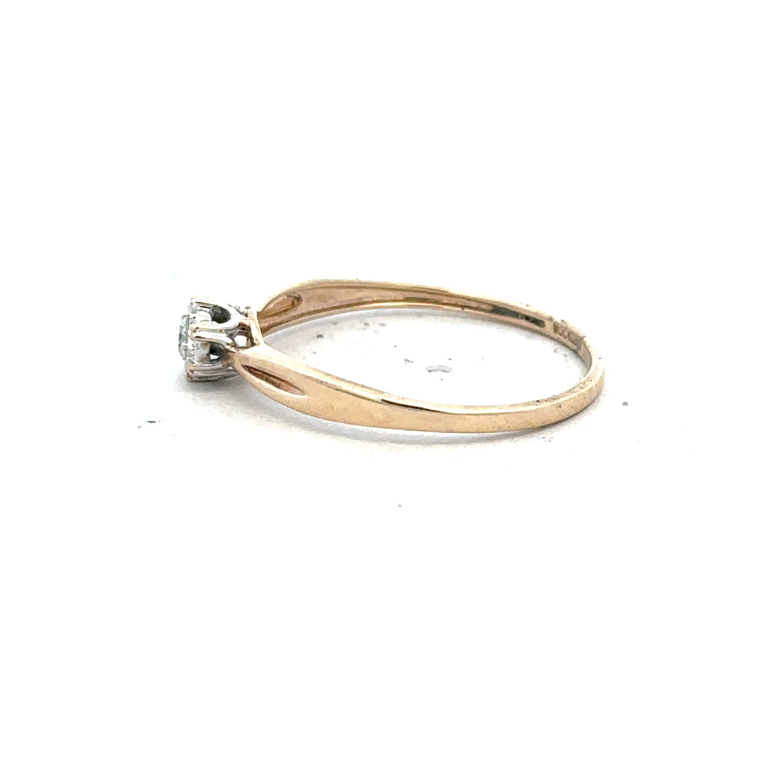 9ct yellow gold diamond ring in size S, featuring a sparkling diamond setting and a classic design.
