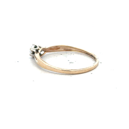 9ct yellow gold diamond ring in size S with a sparkling diamond, unbranded jewelry piece with elegant design.