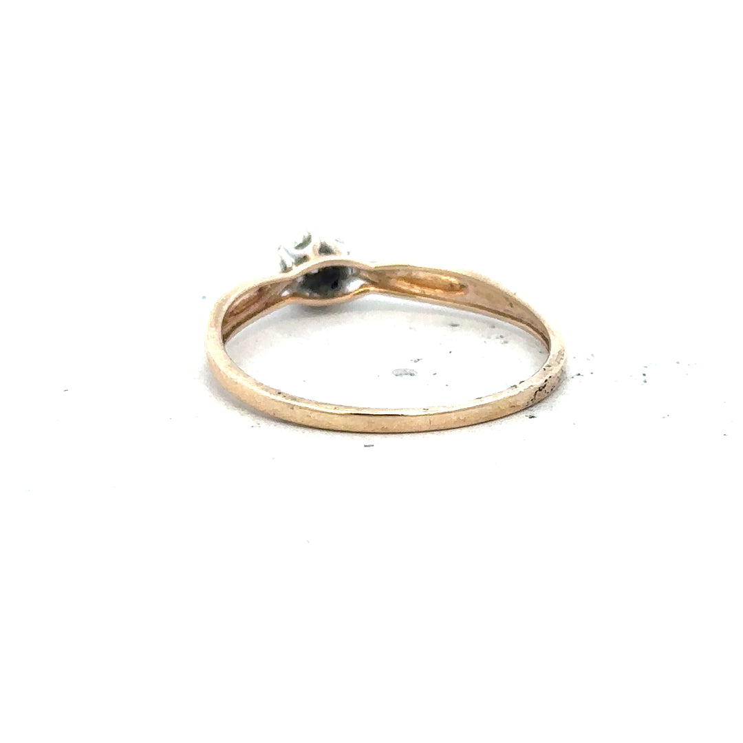9ct yellow gold diamond ring in size S, featuring a sparkling diamond setting, unbranded jewelry piece.