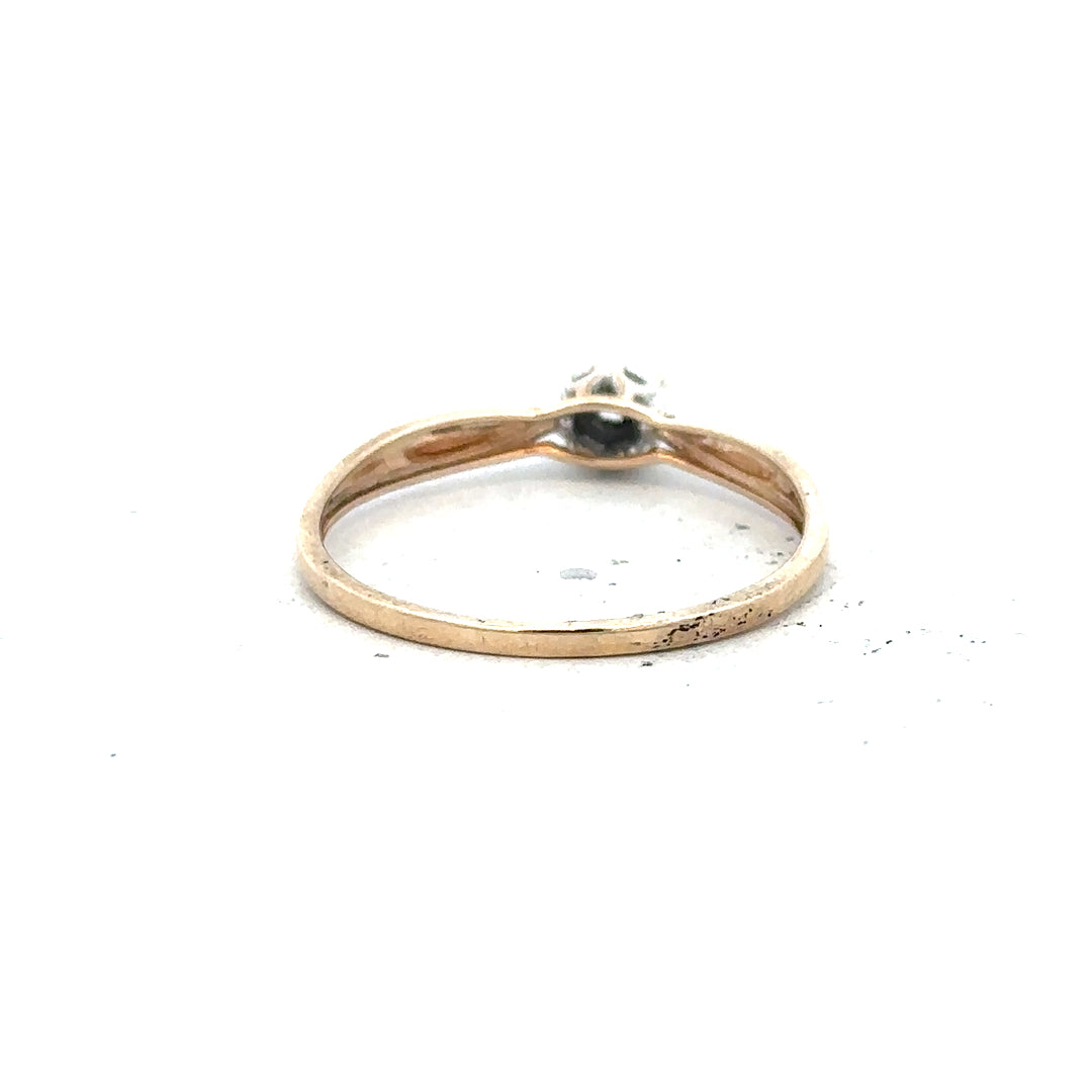 9ct yellow gold diamond ring in size S, featuring a sparkling diamond setting and a classic design.