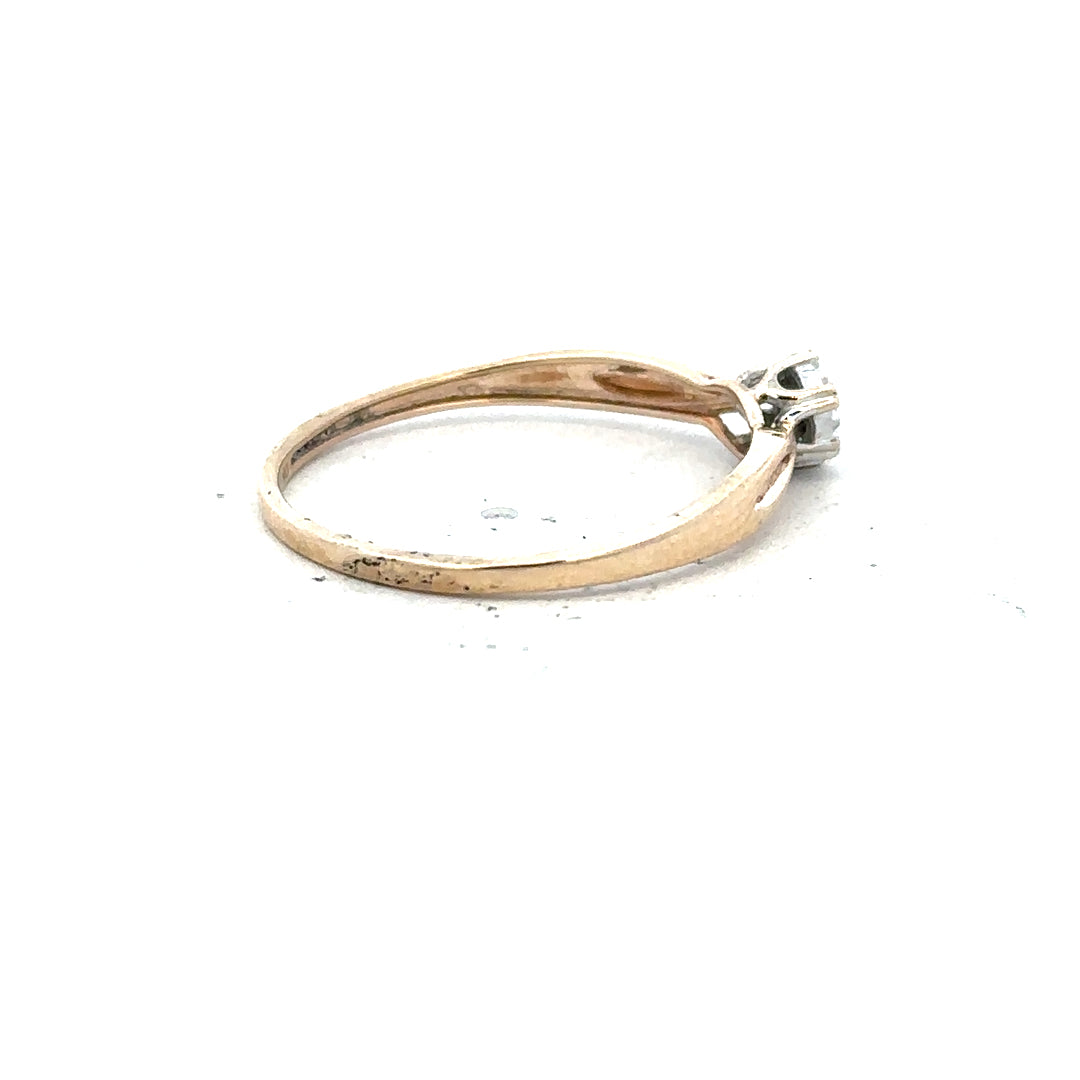 9ct yellow gold diamond ring in size S with sparkling diamonds, showcasing elegant jewelry design.