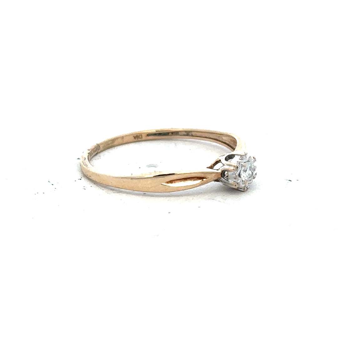 9ct yellow gold diamond ring in size S with sparkling diamonds, showcasing an elegant and classic jewelry design
