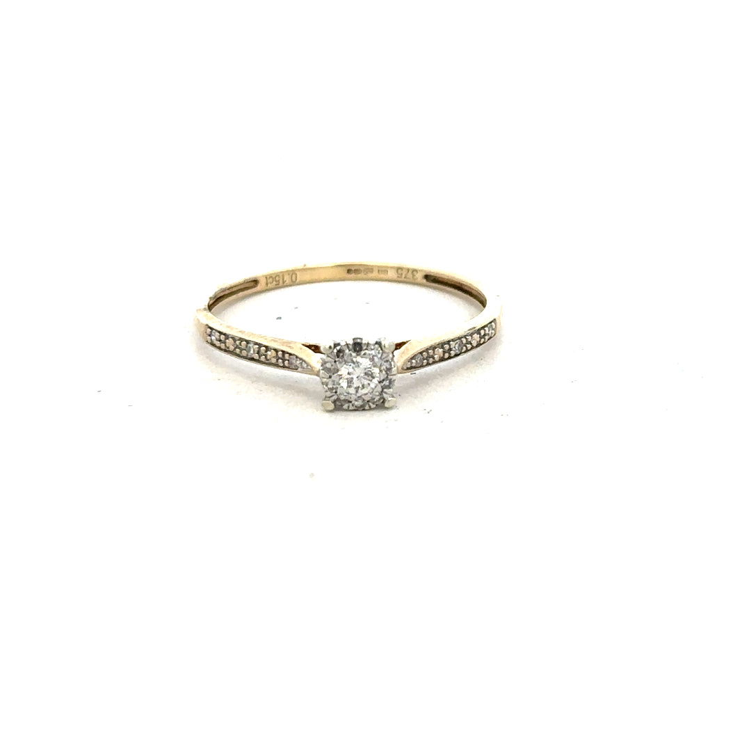 9ct yellow gold diamond ring in size T with sparkling diamonds, unbranded jewelry displayed on white background.