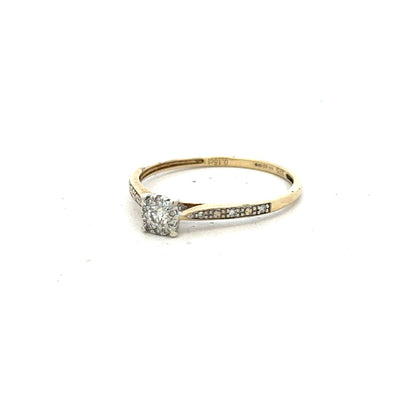 9ct yellow gold diamond ring in size T with sparkling diamonds, showcasing a sleek and elegant jewelry design.