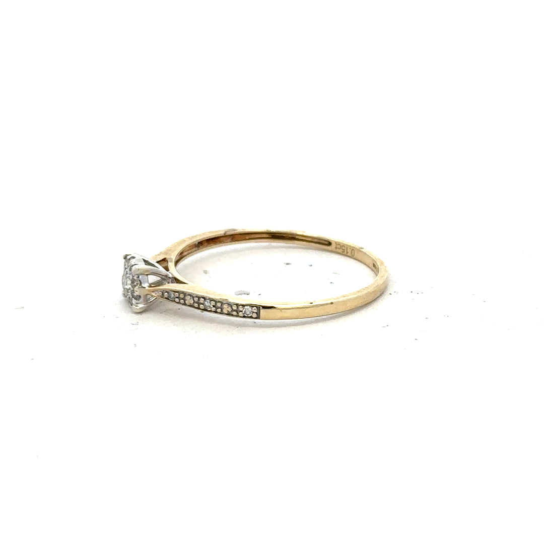 9ct yellow gold diamond ring in size T with sparkling diamonds, featuring a classic and elegant design.