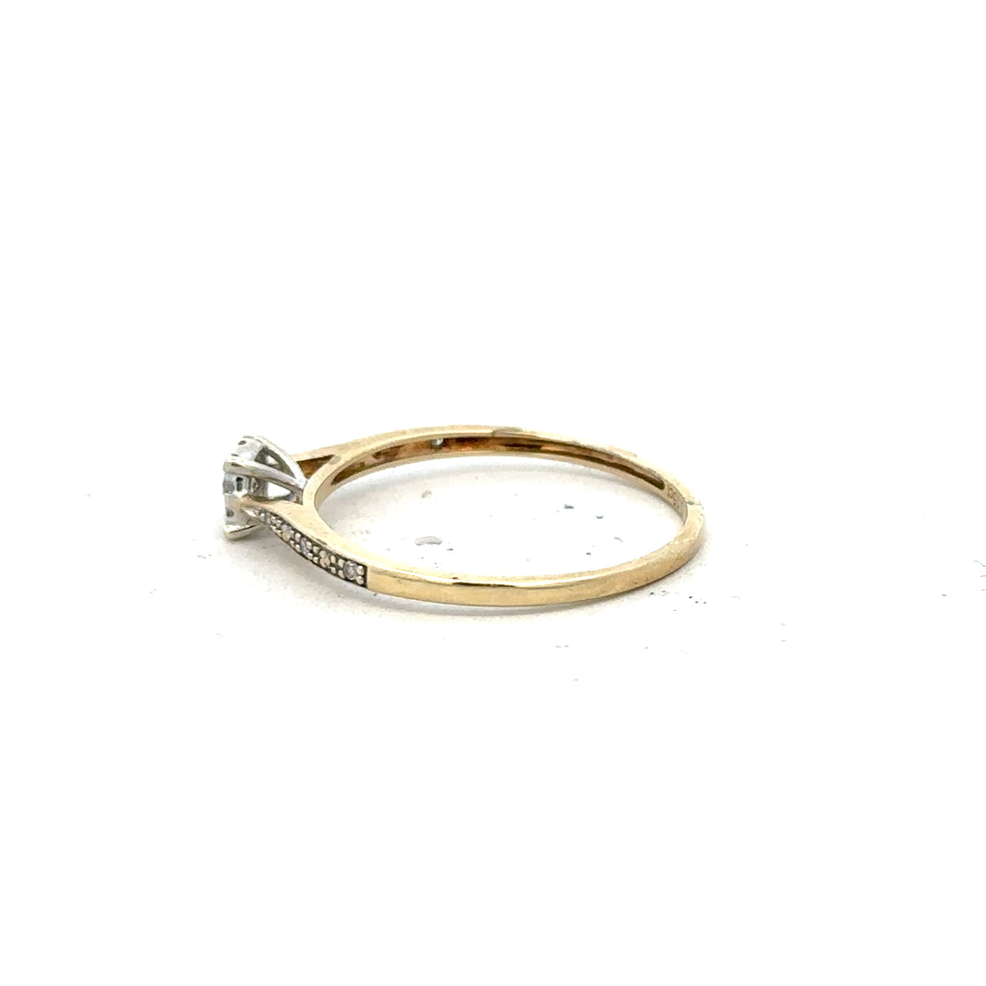 9ct yellow gold diamond ring in size T, featuring a sparkling diamond, unbranded jewelry piece with elegant design