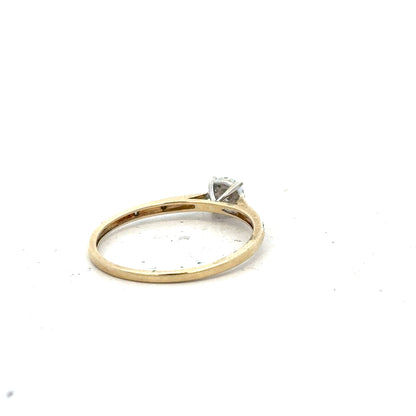 9ct yellow gold diamond ring in size T with sparkling diamonds, unbranded jewelry piece displayed on a plain background.