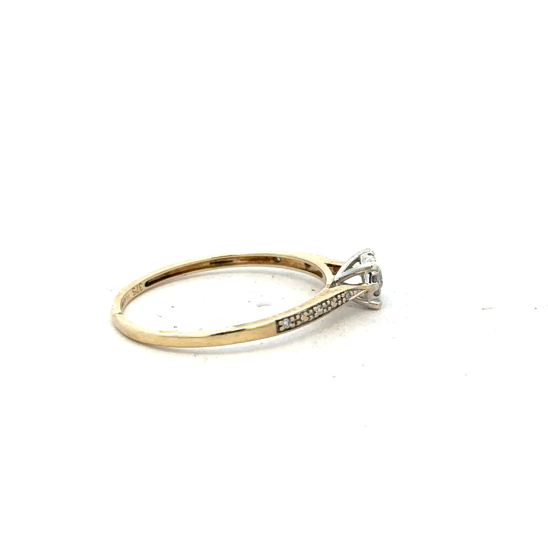 9ct yellow gold diamond ring in size T with sparkling diamonds, unbranded jewelry piece.
