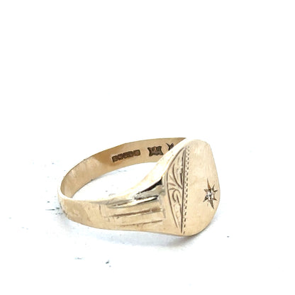 9ct yellow gold diamond ring size T, unbranded, featuring a sparkling diamond centerpiece and a classic gold band.