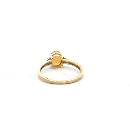 9ct yellow gold diamond ring in size T1/2 featuring a sparkling diamond, displayed on a plain background.