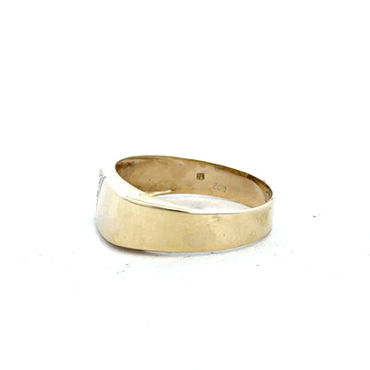 9ct yellow gold diamond ring in size V with a sparkling central diamond and intricate band design.