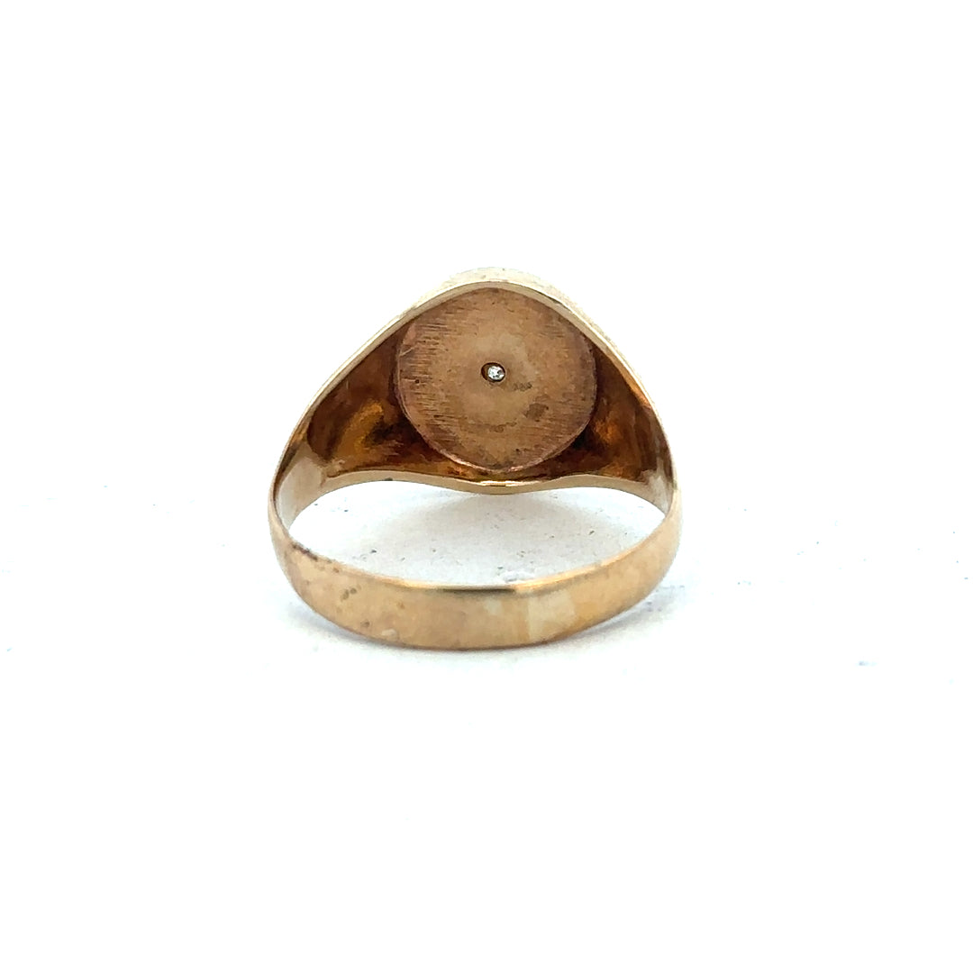 9ct yellow gold diamond signet ring in size U, featuring a polished gold surface and a central diamond accent.