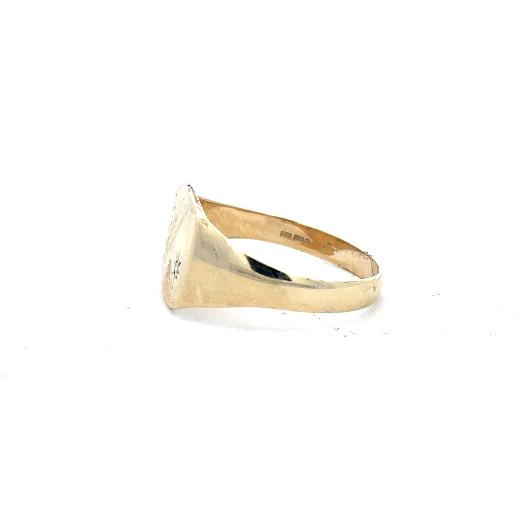 9ct yellow gold diamond signet ring in size Y, featuring a polished gold band and a diamond-studded face, unbranded.